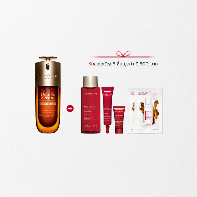 ขวด Clarins Double Serum Light Texture ขนาด 50 มล.วางอยู่ท่ามกลาง Turmeric และใบ Proven&ccedil;al Reed บนพื้นหลังสีส้ม