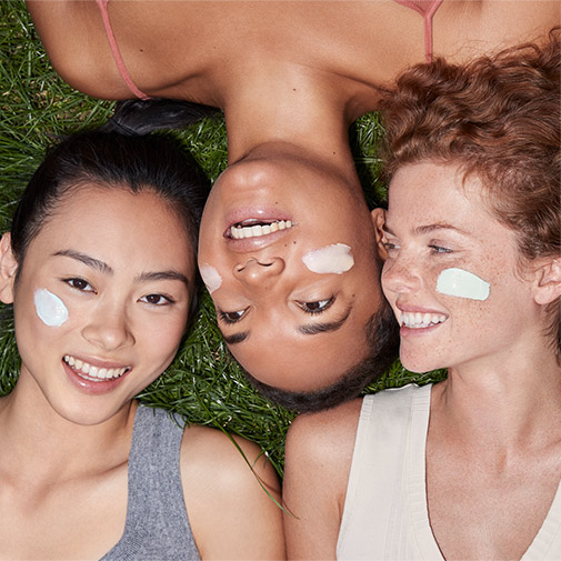 3 young women laughing